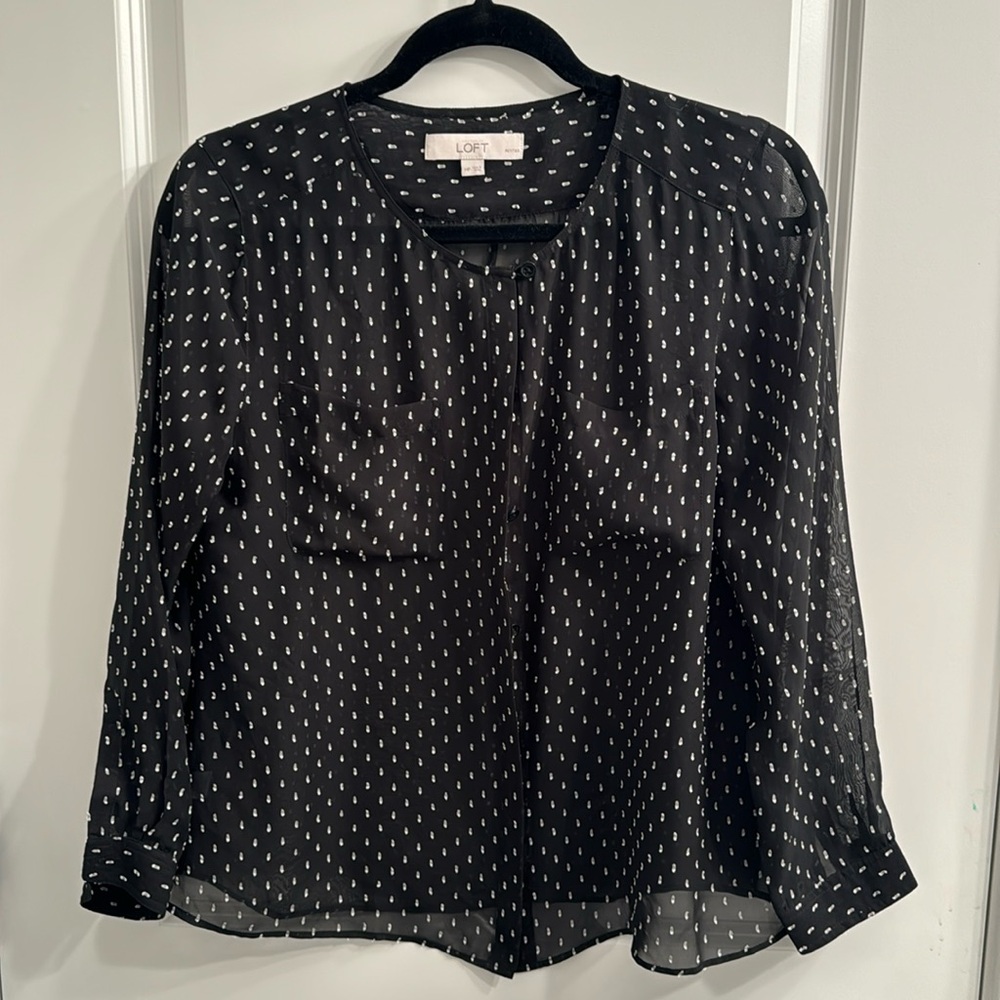 Sheer black Loft blouse with silver ribbon accents.